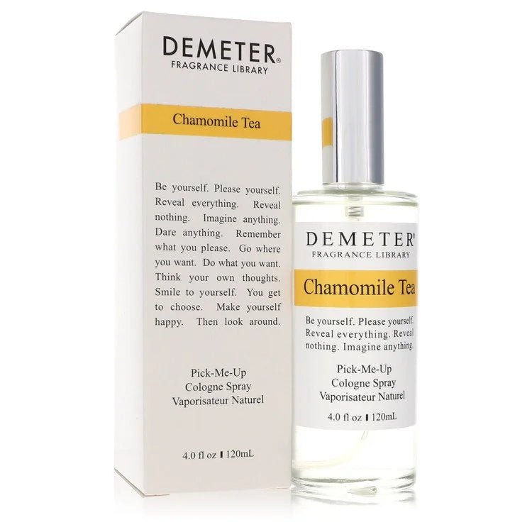 Demeter Chamomile Tea Perfume signature luxury clean rectangular architectural glass column flacon showcasing its transparent fluid boundaries, styled with a minimalist white typographic label, and topped with a sleek polished silver metal capping architecture detail against a solid backdrop