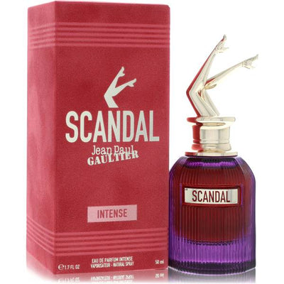 Jean Paul Gaultier Scandal Intense bottle - purple ribbed glass bottle topped with golden legs featuring cardamom, ylang-ylang, and vanilla absolute
