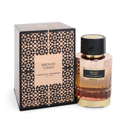 Bronze Tonka cologne bottle for men by Carolina Herrera — Oriental spicy woody fragrance with cardamom, cinnamon, floral accord, tonka bean, amber, and sandalwood notes