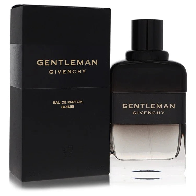 Givenchy Gentleman Eau De Parfum Boisée signature luxury heavy clear-to-dark smoky gradient rectangular glass flacon displaying a classic structural baseline, precise typographic labels, and topped with a sleek geometric black cap configuration detail against a solid backdrop