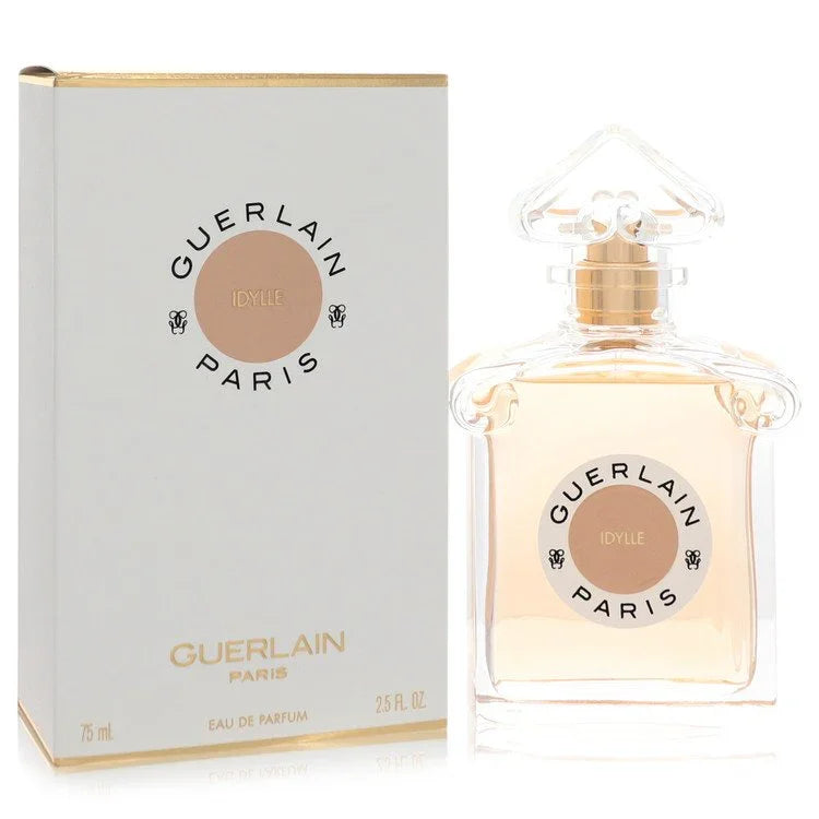 Guerlain perfume bottle and packaging on a white background