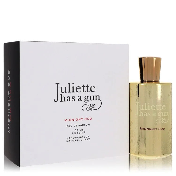Gold perfume bottle and packaging with 'Juliette has a gun' branding on a white background