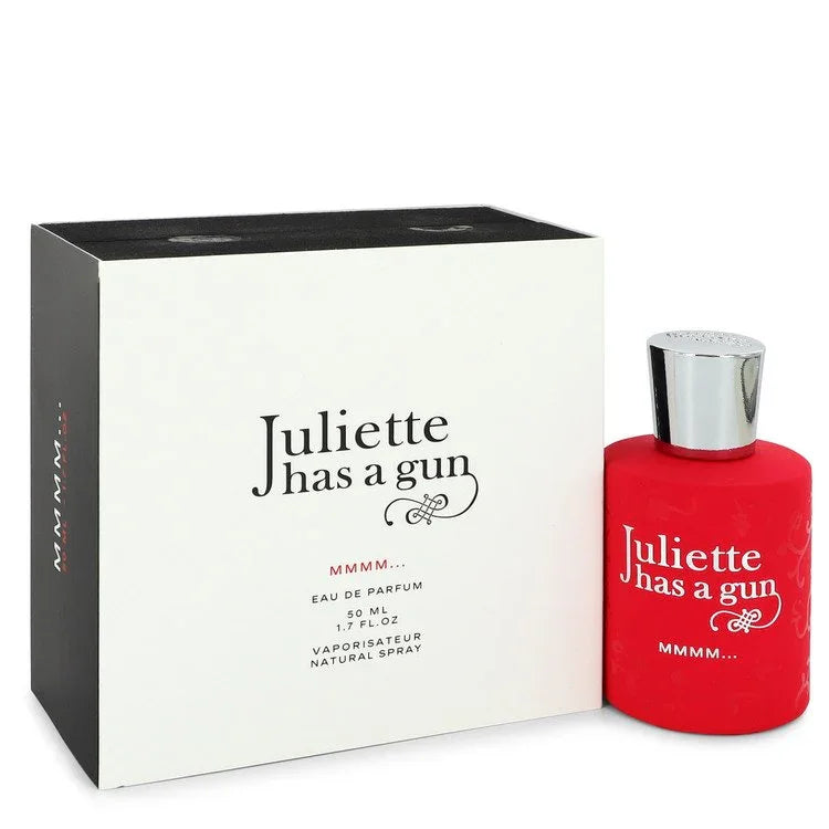 Red perfume bottle with silver cap and black box labeled 'Juliette has a gun' on a white background