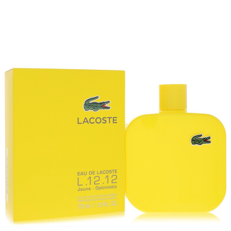 Yellow Lacoste perfume bottle and packaging on a white background