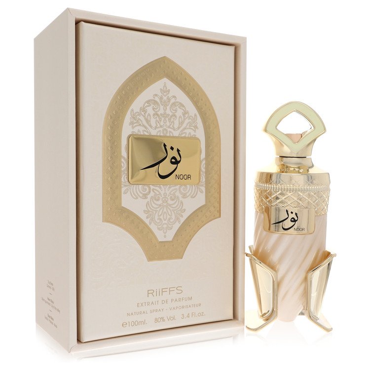 Riiffs Noor Perfume bottle with ornate gold design and extrait de parfum packaging in white and gold