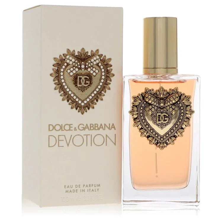 Dolce & Gabbana Devotion perfume bottle and box, featuring ornate gold heart design