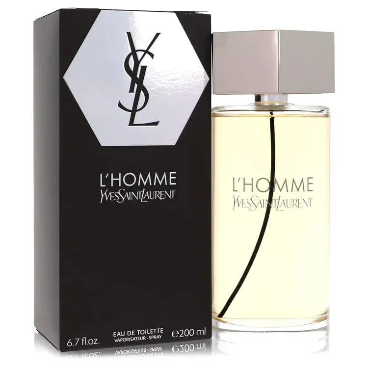 An authentic glass bottle of YSL L'Homme cologne by Yves Saint Laurent featuring its signature clear hexagonal cap and elegant golden liquid.
