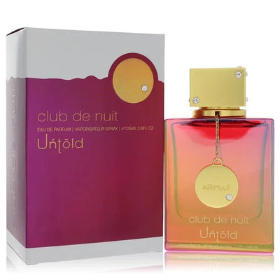 Club de Nuit Untold Eau de Parfum spray bottle and box, gradient colors, for men and women