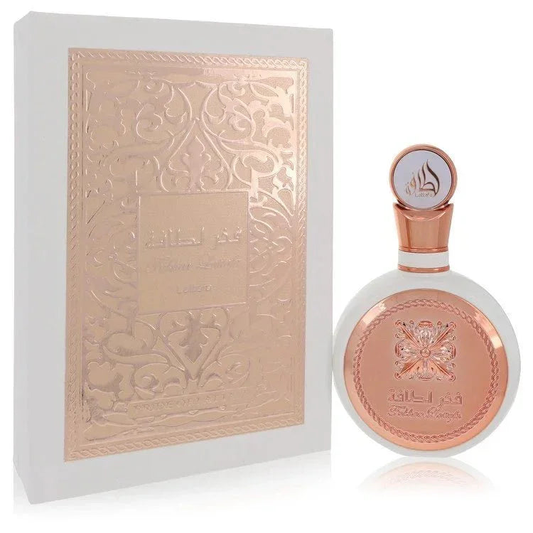 Elegant round perfume bottle with rose gold accents and ornate matching gift box