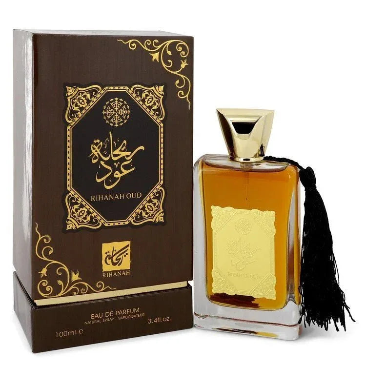 Rihanah Oud Eau de Parfum bottle with gold label and tassel next to ornate packaging box
