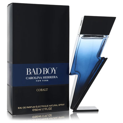 Bad Boy Cobalt cobalt blue lightning bolt cologne bottle for men by Carolina Herrera — Aromatic woody fragrance with bergamot, sage, elemi resin, violet leaf, iris, vetiver, guaiac wood, cashmere, and musk notes