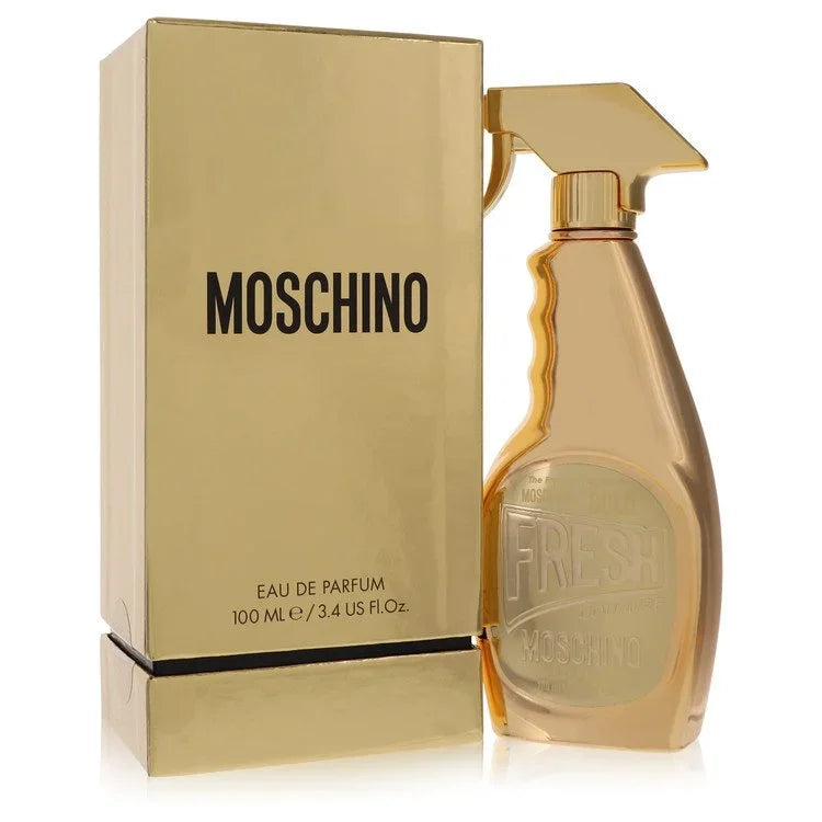 Moschino Fresh Gold Couture Perfume bottle with pear, peach, mandarin, rhubarb, jasmine, orchid, vanilla and Akigalawood

