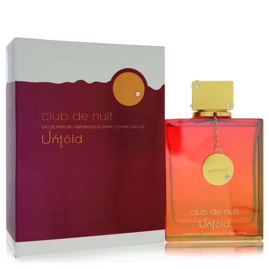 Armaf Club De Nuit Untold Eau de Parfum bottle in holographic glass — amber woody fragrance with saffron, jasmine, amberwood, and cedar.