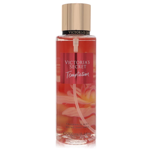 Victoria's Secret Temptation fragrance mist bottle on a white background