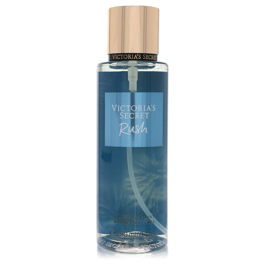Victoria’s Secret Rush fragrance mist bottle with clementine, white flowers, and crystal amber notes in an amber-floral body spray style