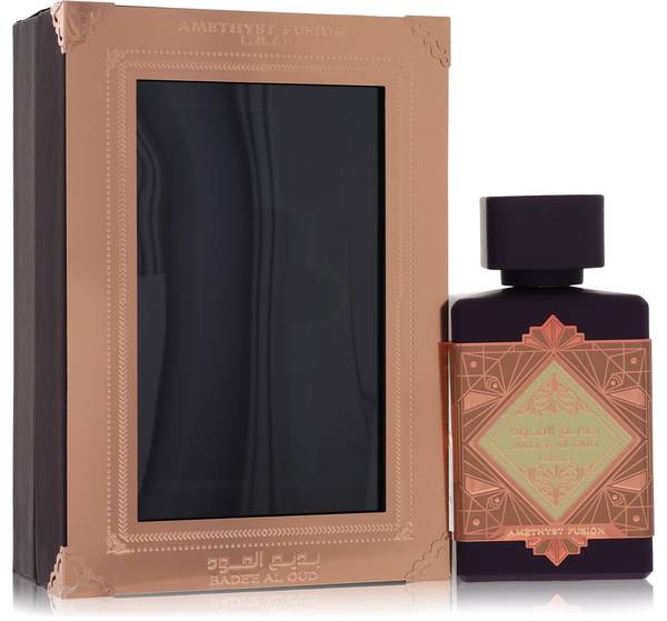Lattafa Bade'e Al Oud Amethyst Fusion Eau de Parfum bottle - Unisex amber woody gourmand fragrance with rum, mandarin, amaretto, amber, patchouli, caramel, benzoin, sandalwood, and vanilla