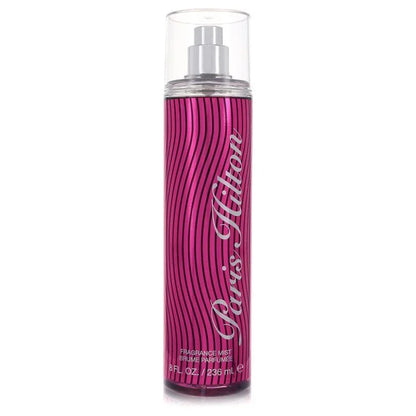 Pink and silver Paris Hilton fragrance mist bottle on a white background