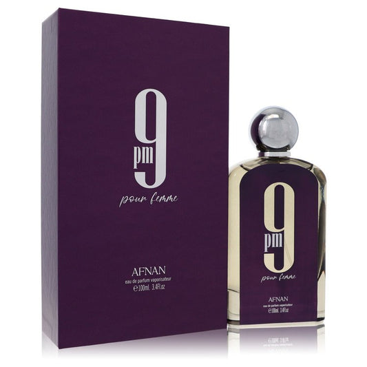 Afnan 9 pm pour femme perfume bottle and packaging on a white background