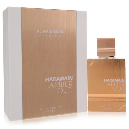 Haramain Amber Oud perfume bottle and packaging on a white background