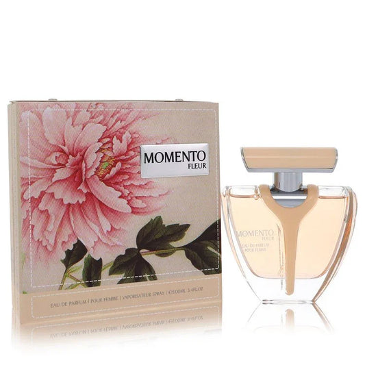 Armaf Momento Fleur women's EDP bottle showing floral woody notes bergamot black currant jasmine tuberose rose sandalwood vanilla musk