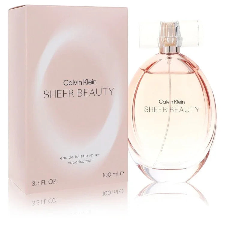 Calvin Klein Sheer Beauty Perfume signature luxury translucent glass flacon showcasing its delicate blush contours and clear curved lines on a clean background