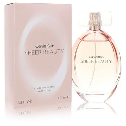 Calvin Klein Sheer Beauty Perfume signature luxury translucent glass flacon showcasing its delicate blush contours and clear curved lines on a clean background