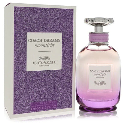 Coach Dreams Moonlight Perfume signature luxury cylindrical clear glass flacon displaying its premium pink fluid contours, precise typographical label boundaries, and elegant silver flower-shaped capping architecture details against a solid background