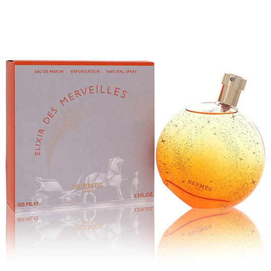 Hermes Elixir des Merveilles perfume bottle and packaging on a white background