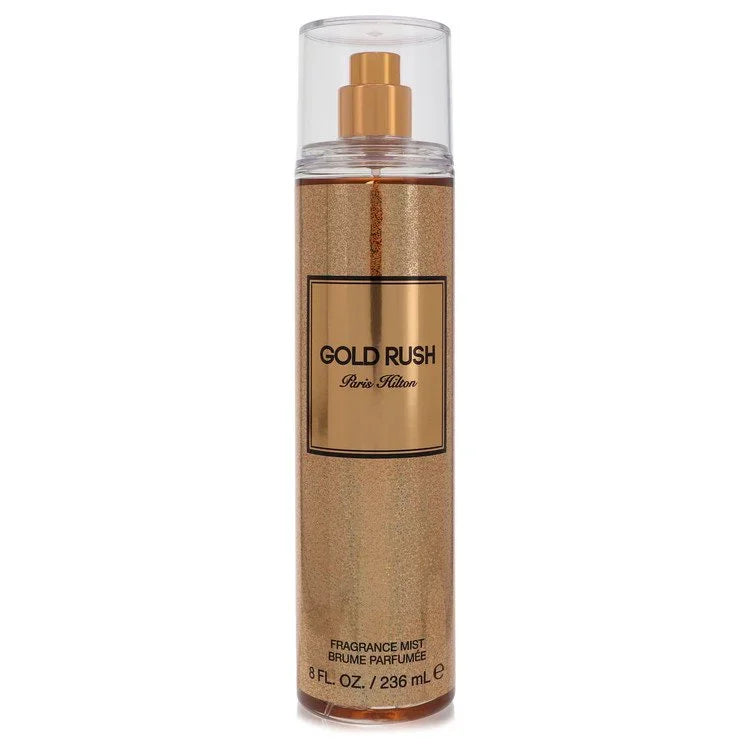 Gold Rush fragrance mist bottle by Paris Hilton on a white background