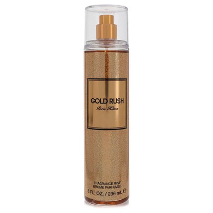 Gold Rush fragrance mist bottle by Paris Hilton on a white background