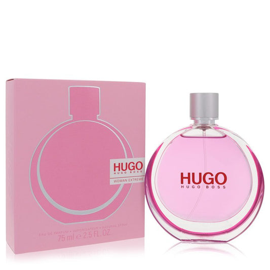 Pink Hugo Boss perfume bottle and packaging on a white background