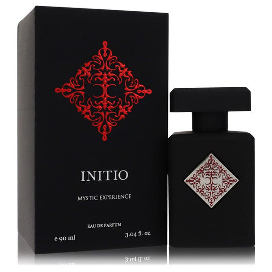 Black perfume bottle and packaging with red and white design, labeled 'Initio Mystic Experience'.
