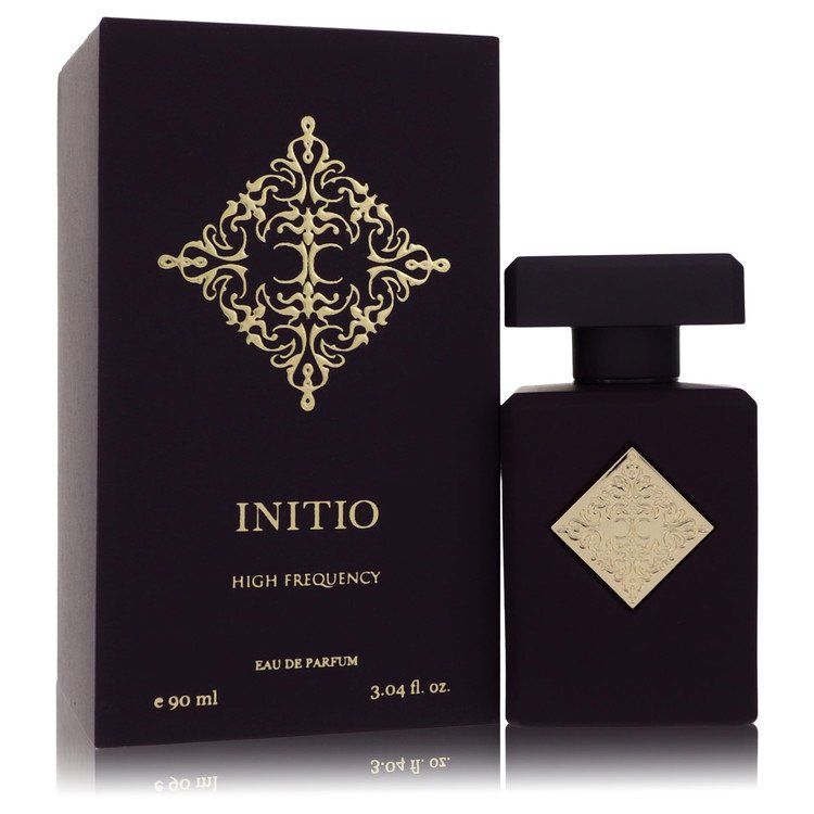 Black perfume bottle and packaging with gold detailing on a white background