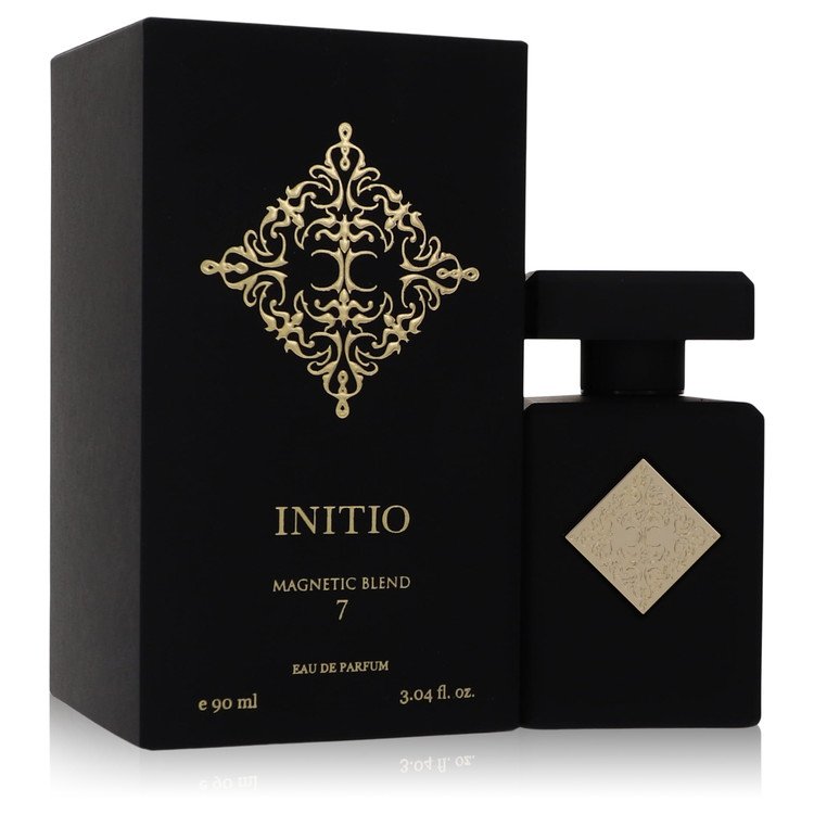 Black perfume bottle and packaging with gold design and 'Initio' branding on a white background
