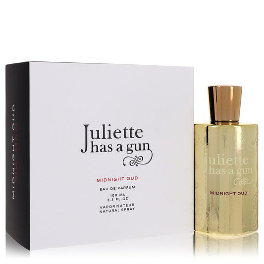 Gold perfume bottle and packaging with 'Juliette has a gun' branding on a white background