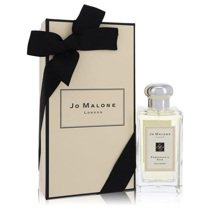 Jo Malone Pomegranate Noir Cologne bottle with pomegranate, plum, lily, clove, guaiacwood, incense, cedar and patchouli
