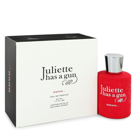 Red perfume bottle with silver cap and black box labeled 'Juliette has a gun' on a white background