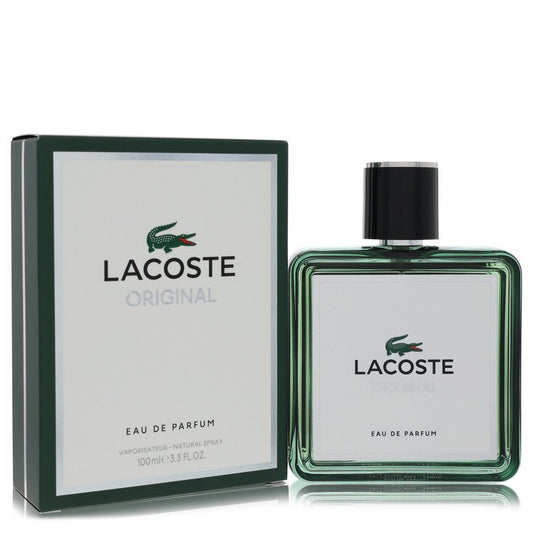 Lacoste Eau de Parfum bottle and packaging on a white background