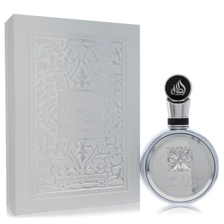 Lattafa Fakhar Platin luxury signature heavy silver metallic flacon displaying its intricate relief design and geometric capping structure against a clean display backdrop