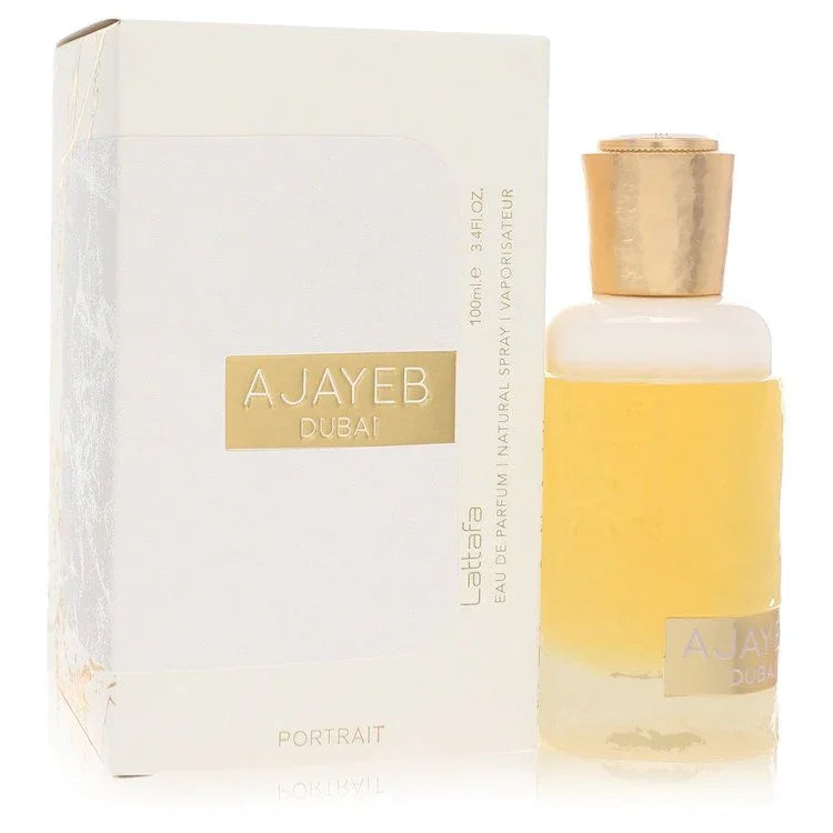 Perfume bottle and packaging of Ajayeb Dubai with gold accents on a white background