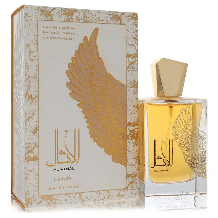 Al Athal perfume bottle and packaging with gold wing design on a white background