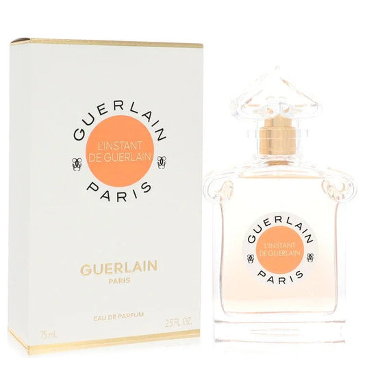 Guerlain L’Instant Eau De Parfum spray for women bottle and box with mandarin, red apple, magnolia, jasmine, and white honey vanilla amber notes