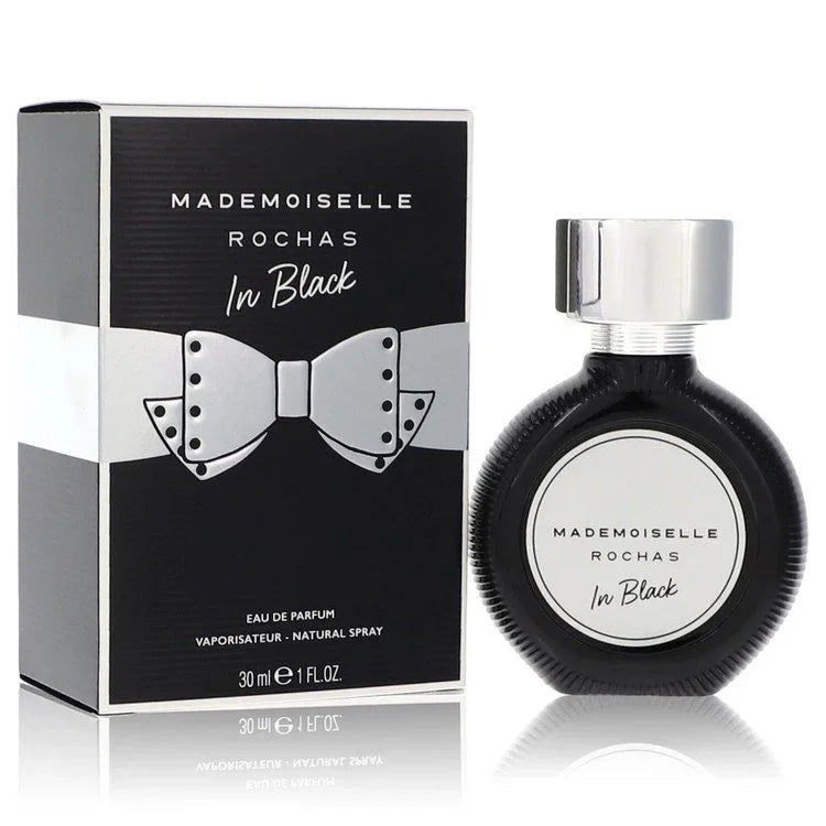 Mademoiselle Rochas In Black perfume bottle and packaging on a white background