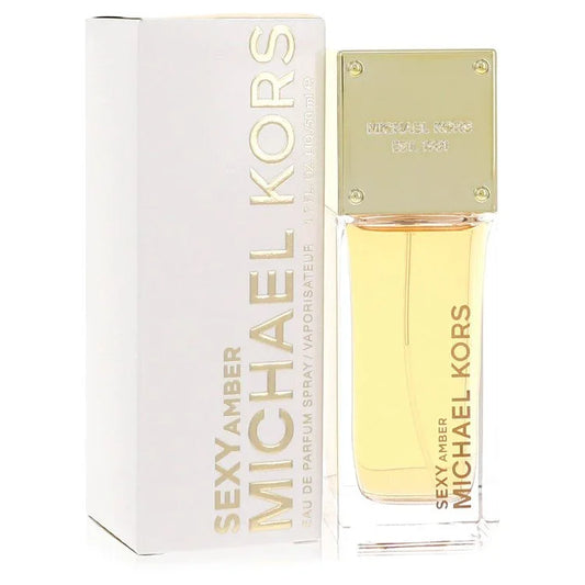 Michael Kors Sexy Amber perfume bottle and packaging on a white background