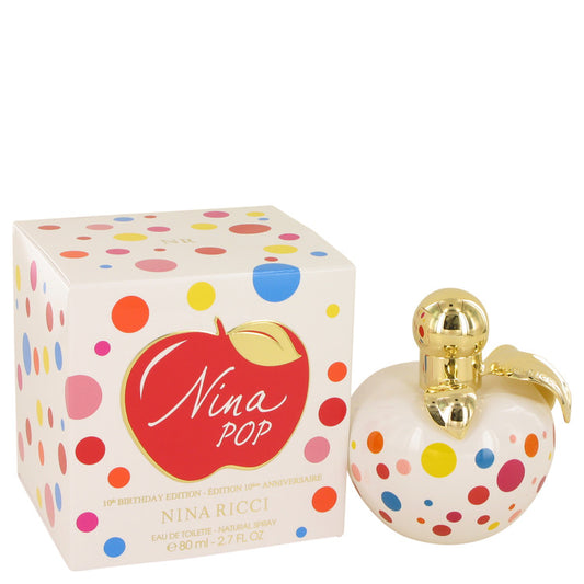 Nina Ricci Nina Pop perfume bottle and packaging with colorful polka dots on a white background