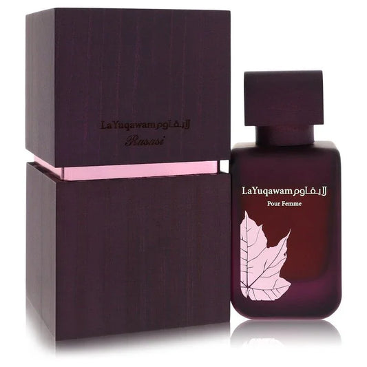 Purple perfume bottle and packaging with 'LaYuqawam' branding on a white background