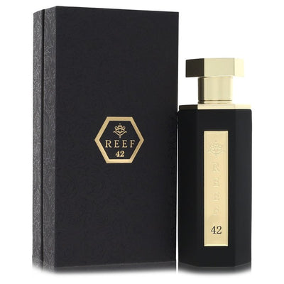 Reef 42 Parfum Perfume bottle — beach-to-city fresh woody amber unisex fragrance with bergamot, lemon, marine accord, cedarwood, and amber.