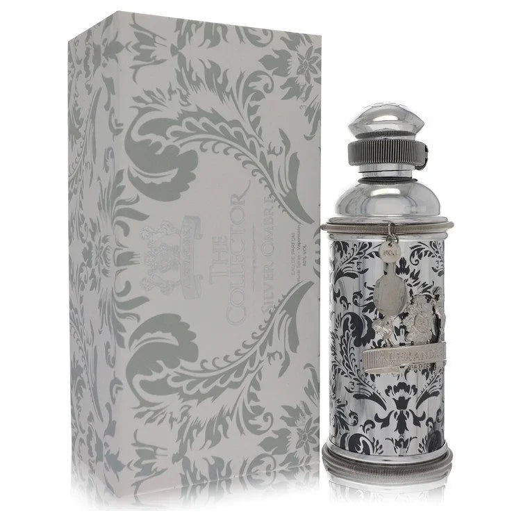 Decorative perfume bottle and box with intricate patterns on a white background