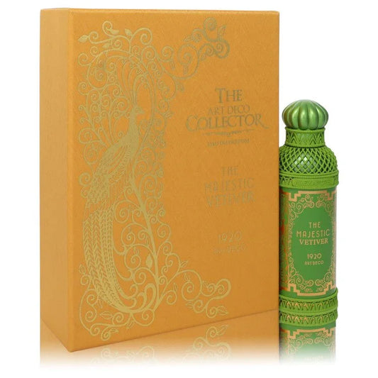 Green perfume bottle with decorative design next to an orange box with intricate gold patterns
