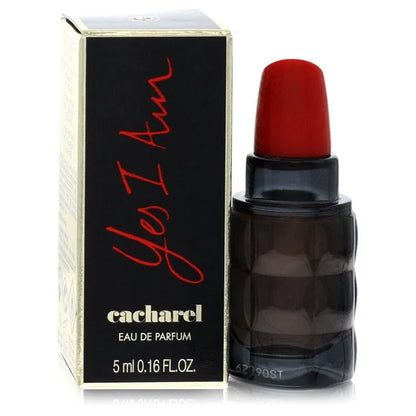 Cacharel Yes I Am perfume bottle with lipstick-inspired design on a white background